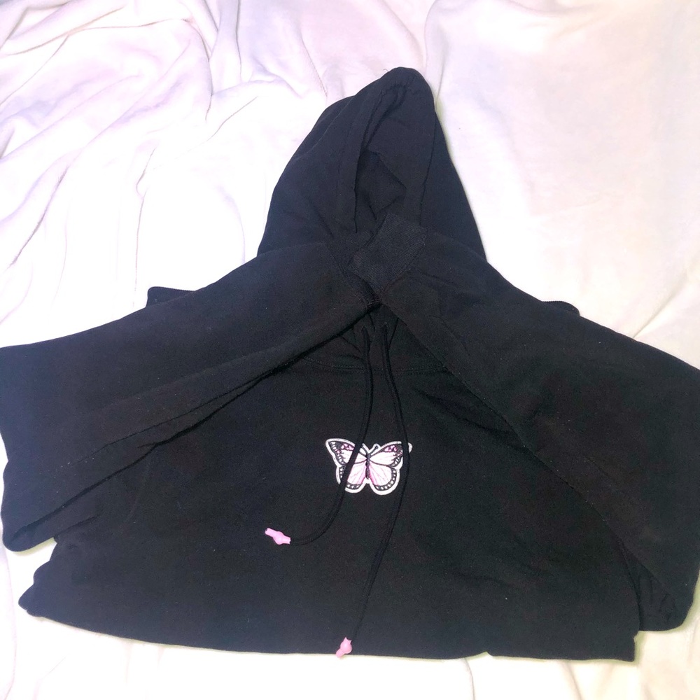 Black oversized butterfly hoodie.